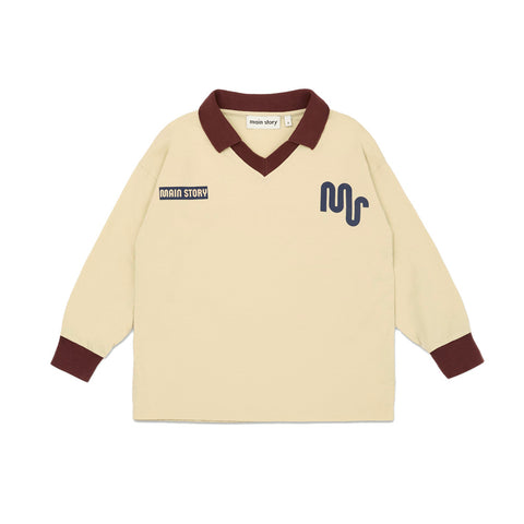 Main Story Beige long-sleeve athletic shirt with burgundy accents and brand logo on a white background